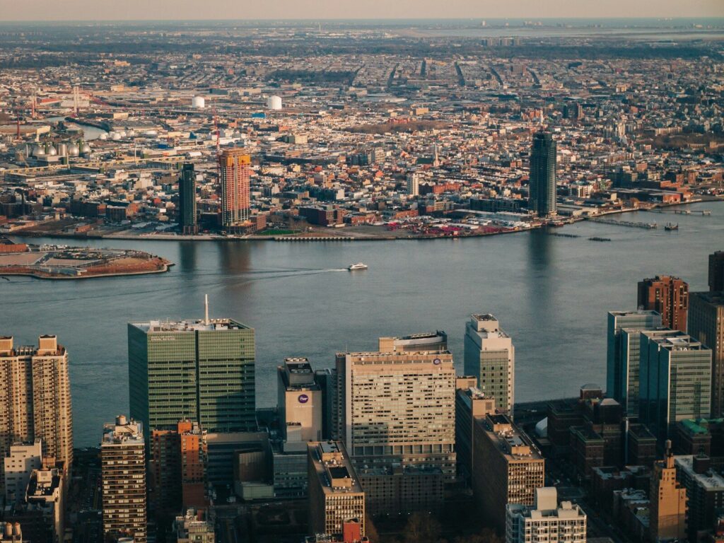 an aerial view of a city with a river running through it
