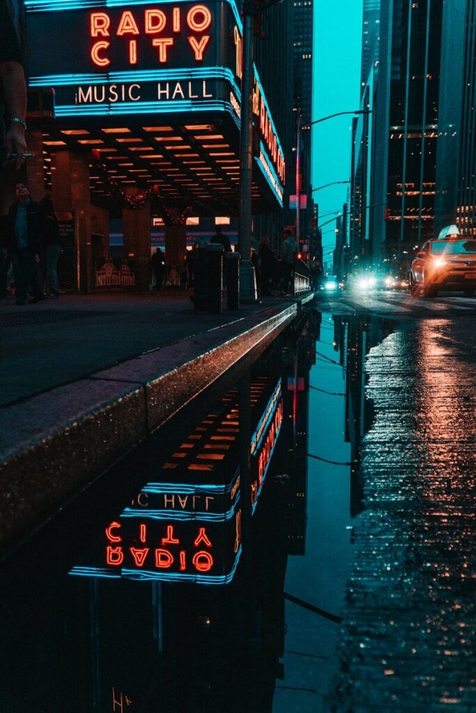 🇺🇸 US Economy & Inflation 2026: What You Need to Know people walking on sidewalk during night time