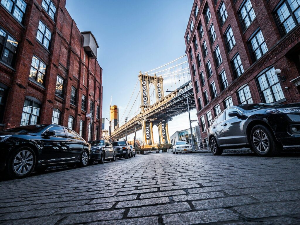 🎬 USA Film Industry — Ek Indian Nazar Se (More Than Just Hollywood) cars parking near building