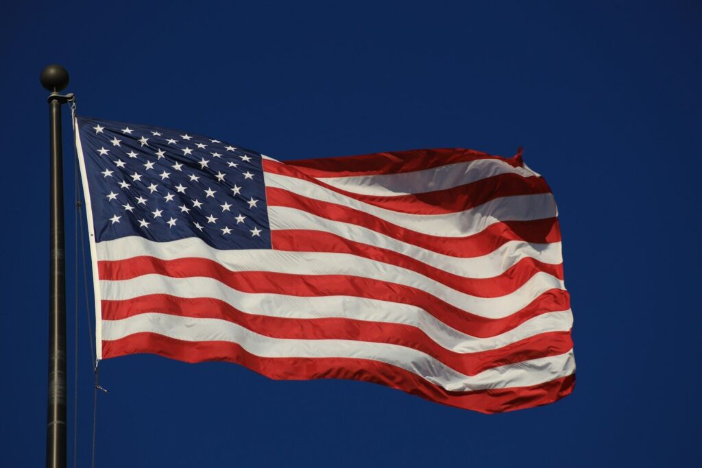 Exploring the Physical Divisions of the United States: A Geological Journey An american flag waving in the wind