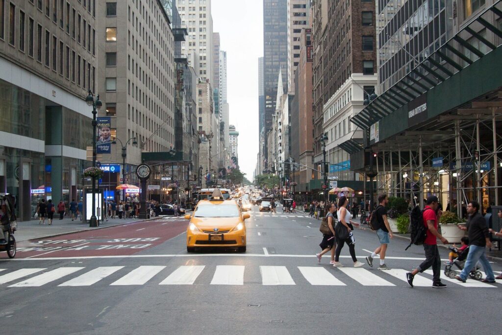 USA Visa Interview Questions: Tips to Ace Your Interview in 2026 people crossing on pedestrian lane during daytime