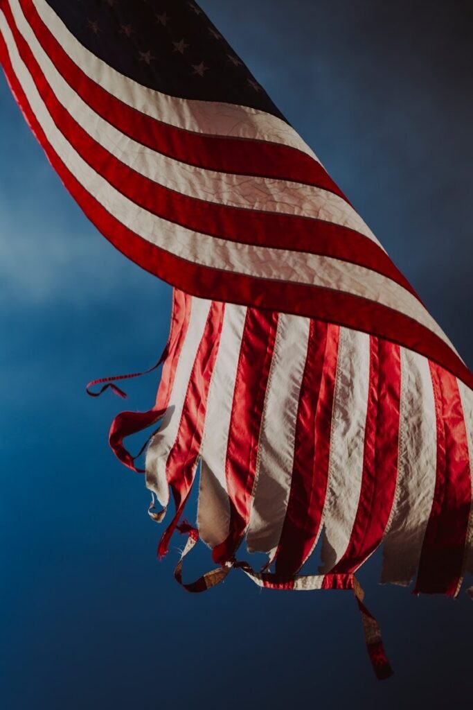 Price Comparison: Daily Items in USA vs India (in Indian Rupees) A large american flag flying in the sky